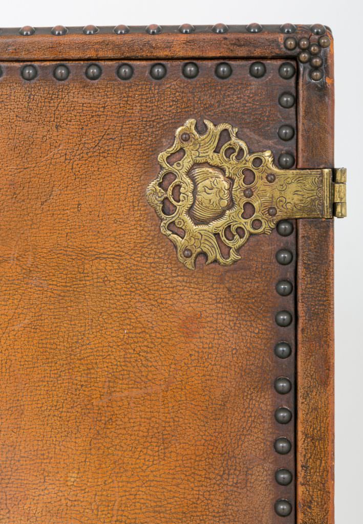 Unusual Carved Oak and Leather Cabinet