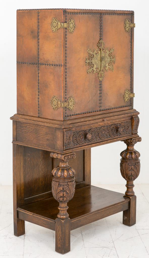 Unusual Carved Oak and Leather Cabinet