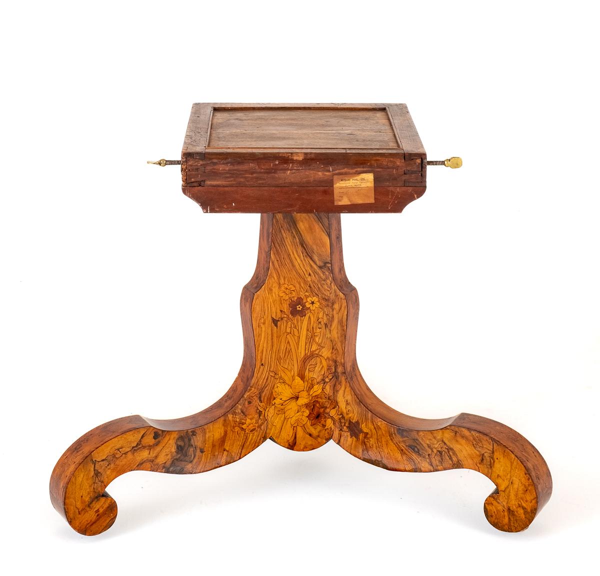 A Stunning Walnut and Marquetry Centre Table