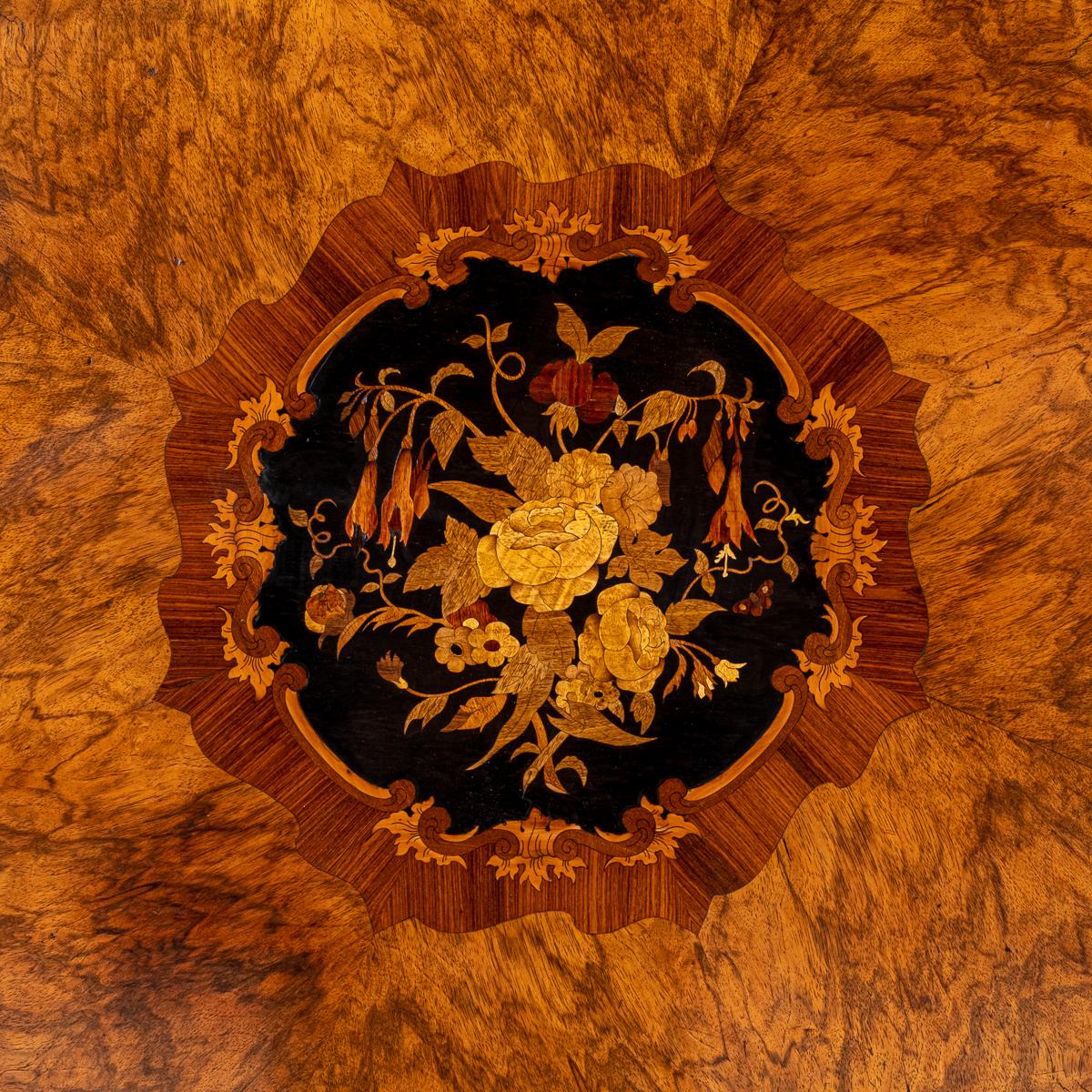 A Stunning Walnut and Marquetry Centre Table