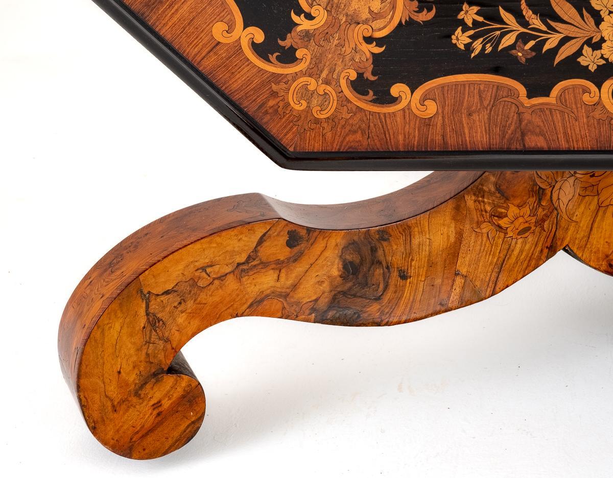 A Stunning Walnut and Marquetry Centre Table